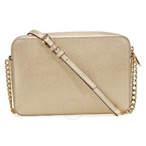 michael kors jet set travel crossbody pale gold|Michael Kors flight crossbody bag.